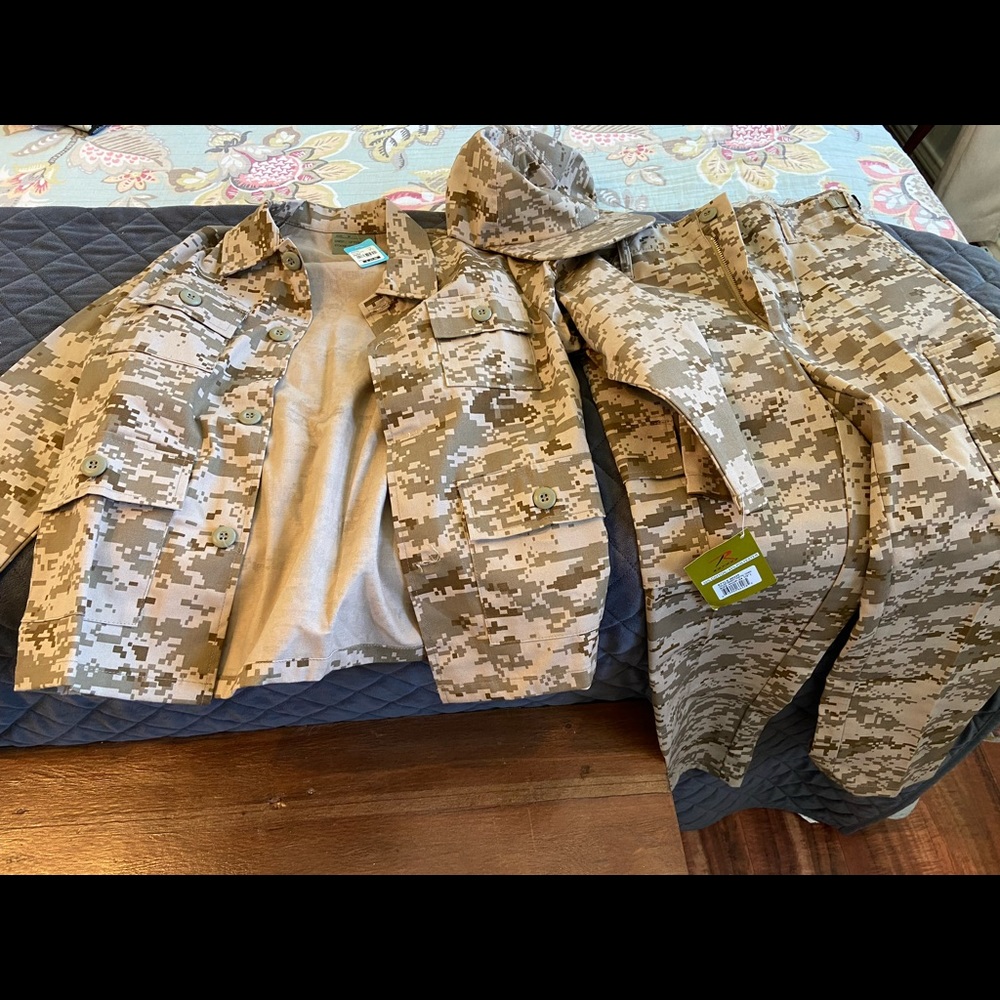 Boys medium outfit/costume. Digital camo. Button up shirt, cargo pants, and hat.